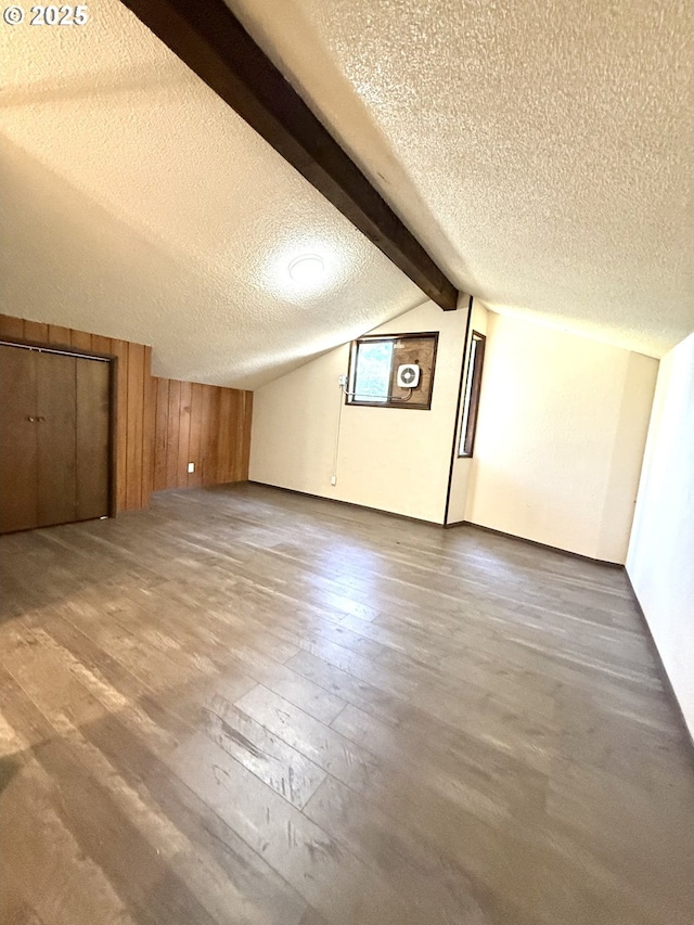 2011/2013 Ohio Ave, North Bend, OR 97459 - bonus room with a textured ceiling and wood finished floors
