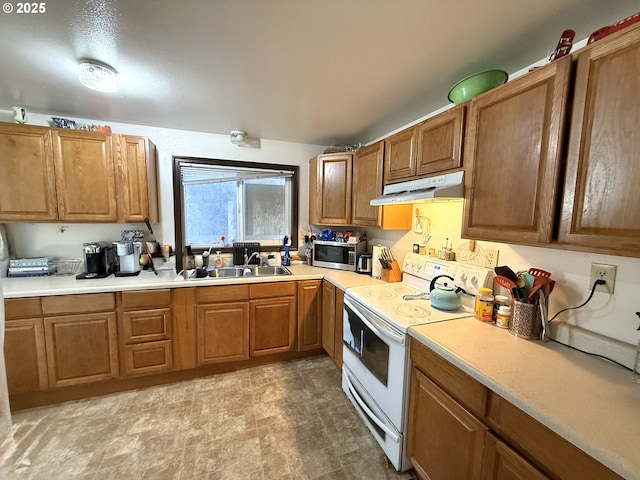 2011/2013 Ohio Ave, North Bend, OR 97459 - kitchen with white electric stove, under cabinet range hood, stainless steel microwave, and brown cabinets