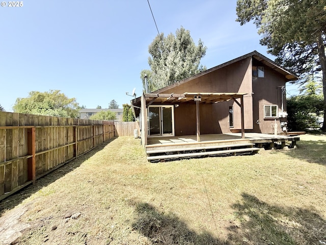 2011/2013 Ohio Ave, North Bend, OR 97459 - back of house featuring a wooden deck, a fenced backyard, and a pergola