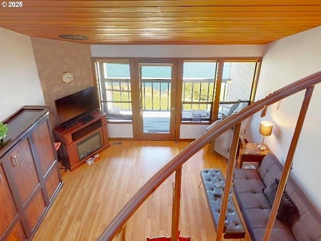 94304 Wedderburn Loop Unit 445, Gold Beach, OR 97444 - living area featuring wooden ceiling and light wood-style floors