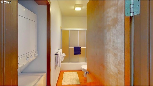 94304 Wedderburn Loop Unit 445, Gold Beach, OR 97444 - full bath featuring toilet, enclosed tub / shower combo, and wood finished floors