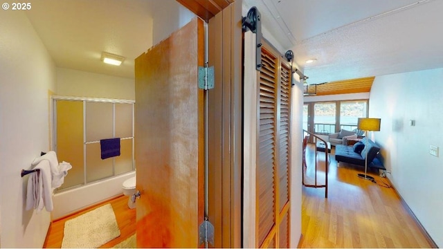 94304 Wedderburn Loop Unit 445, Gold Beach, OR 97444 - corridor featuring wood finished floors