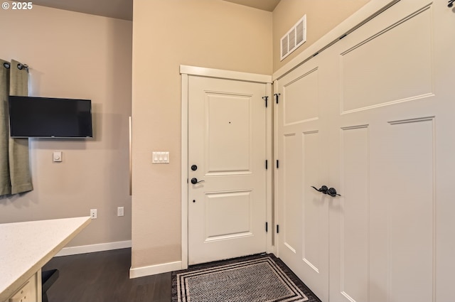 entryway featuring dark hardwood / wood-style floors