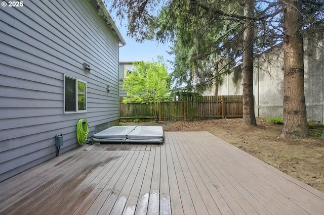 wooden deck featuring fence