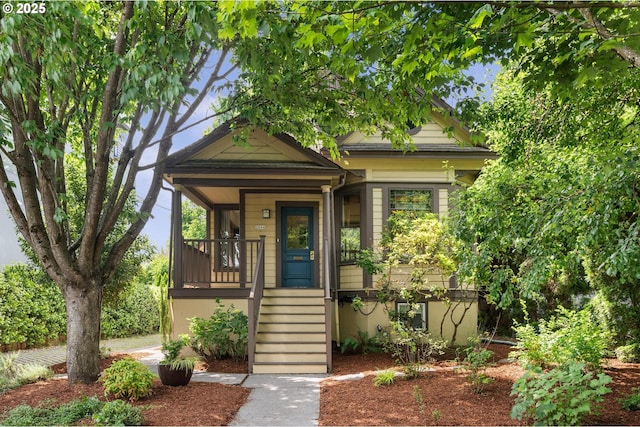 2664 NW Thurman St, Portland, OR 97210 - view of front facade featuring a porch and stairway