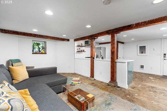 2664 NW Thurman St, Portland, OR 97210 - living area featuring recessed lighting, beam ceiling, and baseboards