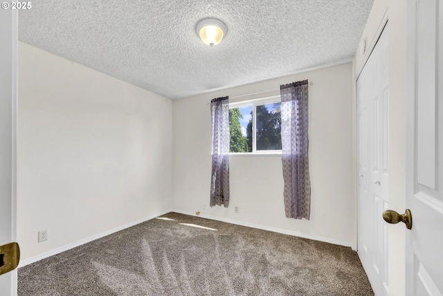 523 65th St, Springfield, OR 97478 - unfurnished room with carpet, a textured ceiling, and baseboards