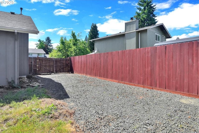 523 65th St, Springfield, OR 97478 - view of yard featuring a gate