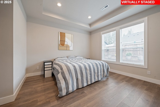 2417 NE 2nd Ct, Battle Ground, WA 98604 - bedroom featuring wood finished floors, a raised ceiling, recessed lighting, and baseboards