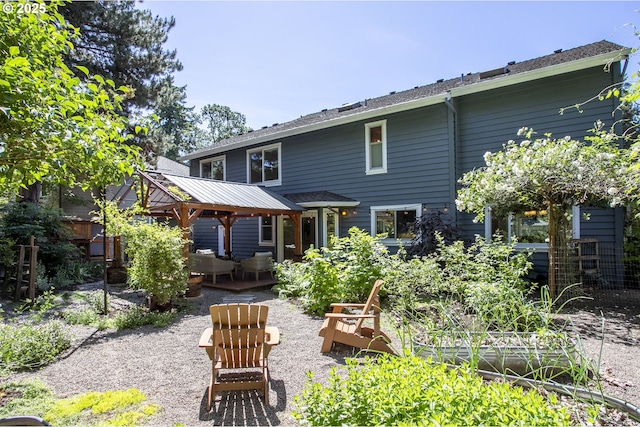 13555 SW Hiteon Ct, Beaverton, OR 97008 - rear view of property with a gazebo, an outdoor hangout area, and a patio area