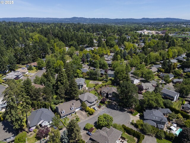 13555 SW Hiteon Ct, Beaverton, OR 97008 - aerial view of property's location featuring nearby suburban area and a forest
