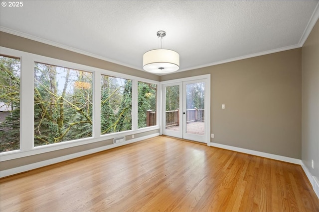 interior space with french doors and visible vents