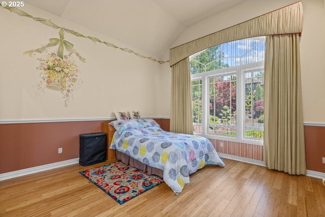 9337 SE Pennington Ct, Happy Valley, OR 97086 - bedroom featuring baseboards, wood-type flooring, and lofted ceiling