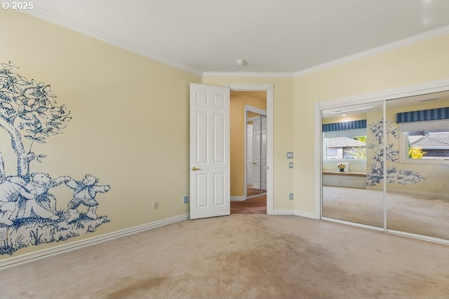 9337 SE Pennington Ct, Happy Valley, OR 97086 - unfurnished bedroom with ornamental molding, carpet floors, a closet, and baseboards