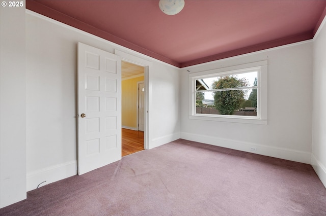 unfurnished room featuring carpet flooring