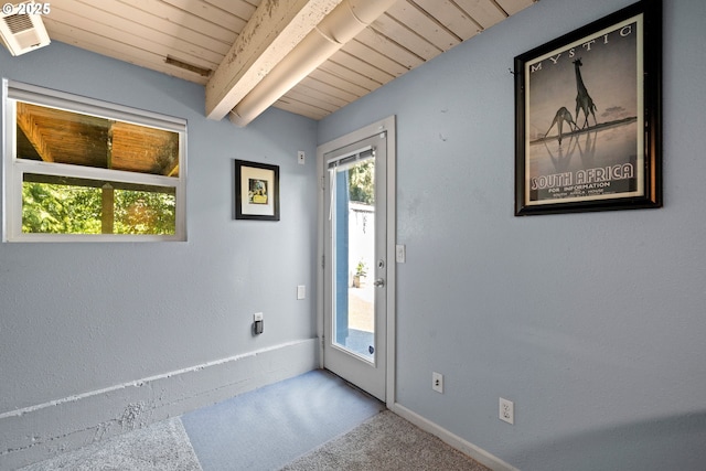 7750 SW 4th Ave, Portland, OR 97219 - carpeted entrance foyer with wooden ceiling with exposed beams and baseboards