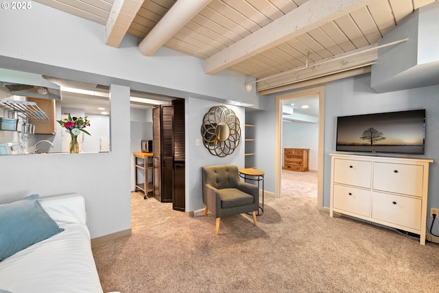 7750 SW 4th Ave, Portland, OR 97219 - living area with light carpet, wood ceiling with exposed beams, and baseboards