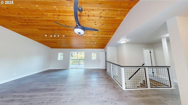 29700 Park Dr, Gold Beach, OR 97444 - empty room featuring wooden ceiling, lofted ceiling, baseboards, wood finished floors, and ceiling fan