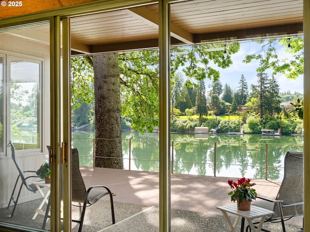 6600 SW Montgomery Way, Wilsonville, OR 97070 - unfurnished sunroom featuring a water view and view of scattered trees