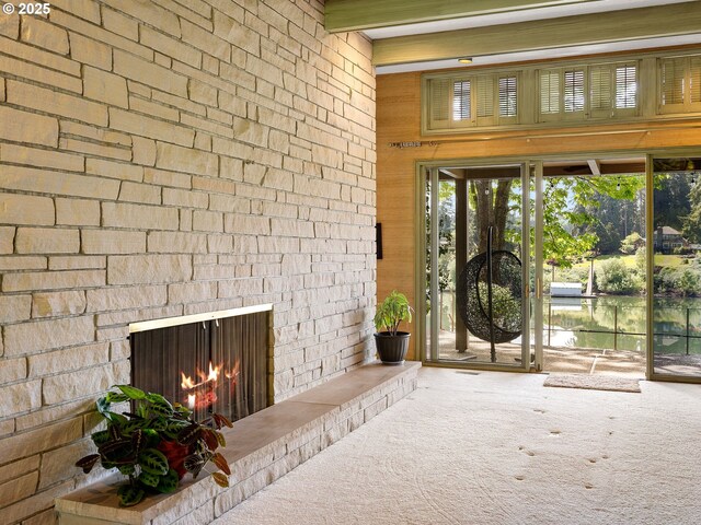 6600 SW Montgomery Way, Wilsonville, OR 97070 - doorway to property with an outdoor stone fireplace