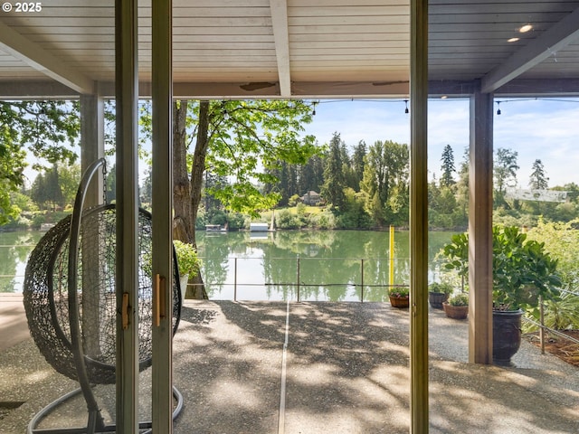 6600 SW Montgomery Way, Wilsonville, OR 97070 - view of patio / terrace featuring a water view and view of wooded area