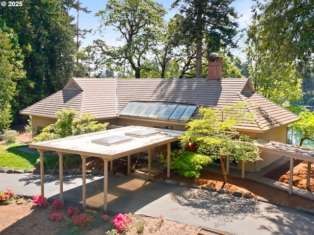 6600 SW Montgomery Way, Wilsonville, OR 97070 - back of house featuring a chimney