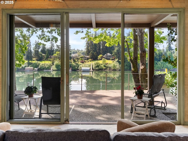 6600 SW Montgomery Way, Wilsonville, OR 97070 - entryway with a water view, healthy amount of natural light, and view of scattered trees