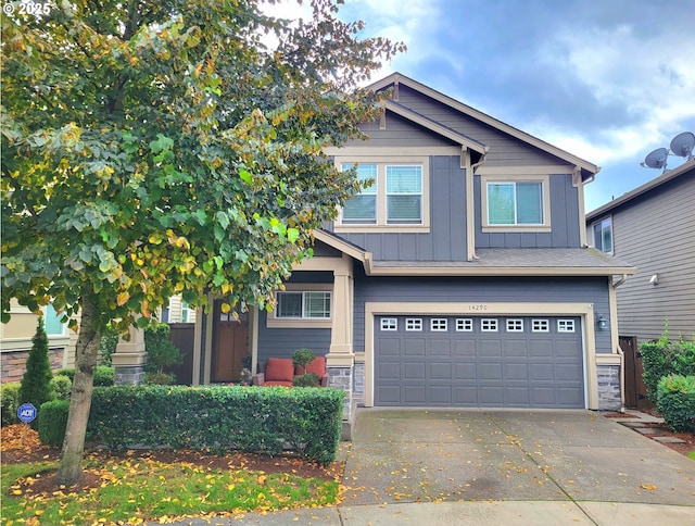 craftsman house with a garage