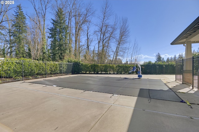 view of pool with a patio area, fence, and a fenced in pool