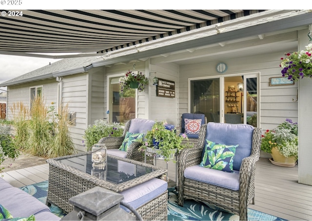 view of patio with a deck and an outdoor hangout area