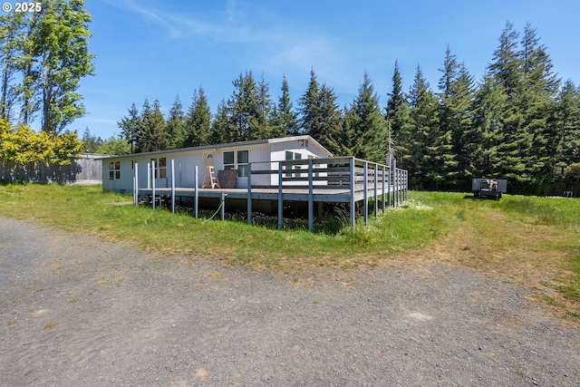 view of front of house featuring a deck