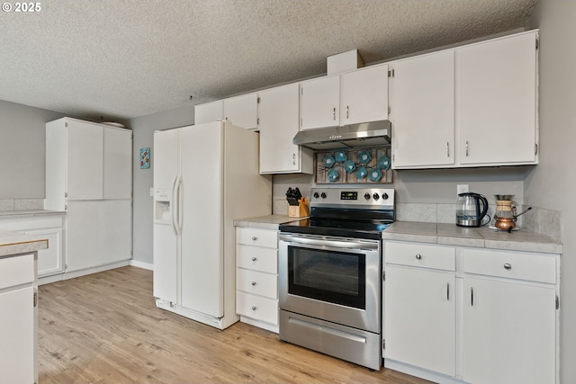 kitchen featuring light wood-style flooring, white refrigerator with ice dispenser, under cabinet range hood, light countertops, and electric stove