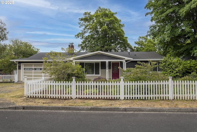 821 13th Ave, Seaside, OR 97138 - ranch-style house with a garage, a fenced front yard, a chimney, and concrete driveway