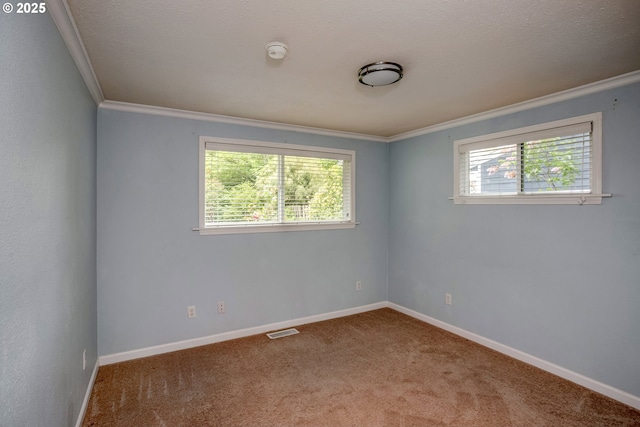 821 13th Ave, Seaside, OR 97138 - spare room with ornamental molding, a smoke detector, and carpet