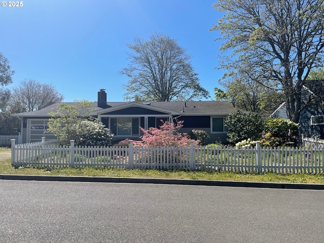821 13th Ave, Seaside, OR 97138 - single story home featuring a fenced front yard and a chimney