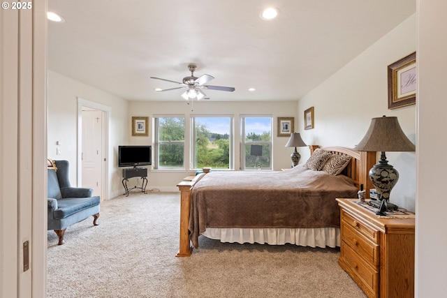 910 Swallow Ave, Sutherlin, OR 97479 - bedroom with light colored carpet, recessed lighting, ceiling fan, and baseboards