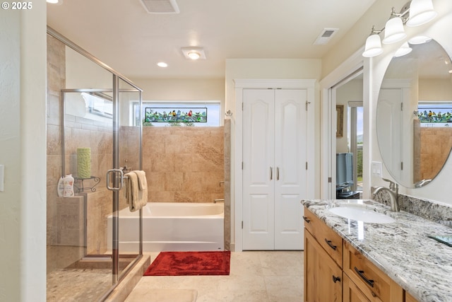 910 Swallow Ave, Sutherlin, OR 97479 - bathroom with vanity, a shower stall, plenty of natural light, and a closet