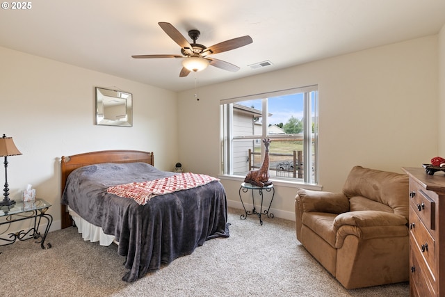 910 Swallow Ave, Sutherlin, OR 97479 - bedroom featuring light carpet, baseboards, and a ceiling fan