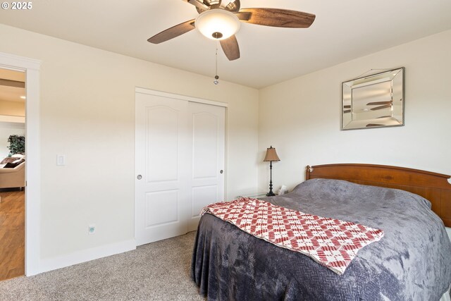 910 Swallow Ave, Sutherlin, OR 97479 - bedroom with carpet flooring, a closet, a ceiling fan, and baseboards