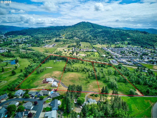 910 Swallow Ave, Sutherlin, OR 97479 - aerial view of property's location featuring property parcel outlined, a forest, and a water and mountain view