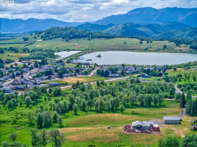 910 Swallow Ave, Sutherlin, OR 97479 - drone / aerial view of a water and mountain view