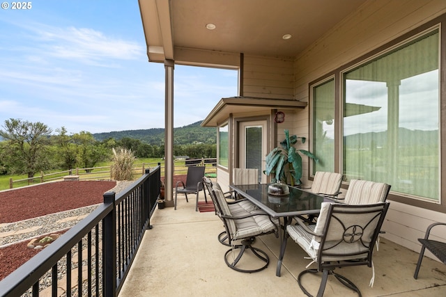 910 Swallow Ave, Sutherlin, OR 97479 - view of patio / terrace with a mountain view and a balcony