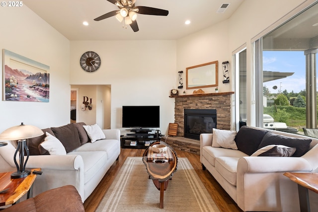 910 Swallow Ave, Sutherlin, OR 97479 - living area featuring wood finished floors, ceiling fan, a fireplace, and recessed lighting