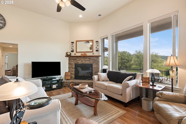 910 Swallow Ave, Sutherlin, OR 97479 - living room featuring a ceiling fan, wood finished floors, a fireplace, and recessed lighting