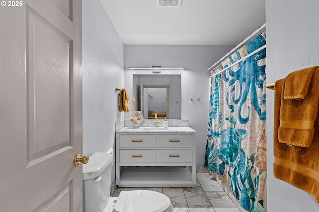 3979 NE Johns Ave, Neotsu, OR 97364 - bathroom with toilet, vanity, marble finish flooring, and a shower with curtain