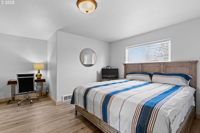 3979 NE Johns Ave, Neotsu, OR 97364 - bedroom with light wood finished floors and baseboards