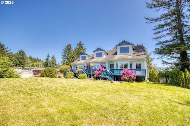 3979 NE Johns Ave, Neotsu, OR 97364 - cape cod home featuring a front yard and a wooden deck