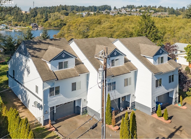 birds eye view of property featuring a water view