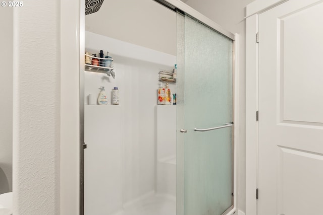 360 NE Rose Ridge Dr, Winston, OR 97496 - bathroom featuring a shower stall