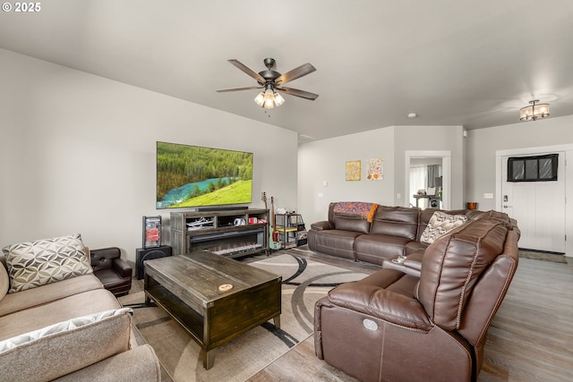 360 NE Rose Ridge Dr, Winston, OR 97496 - living area featuring wood finished floors and ceiling fan